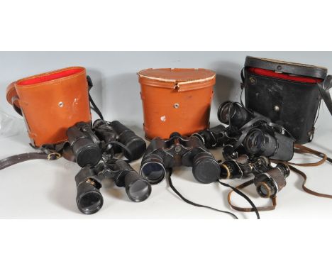 A collection of vintage retro 20th century binoculars and military binoculars to include Shira Zenith 10x50, Zenith triple te