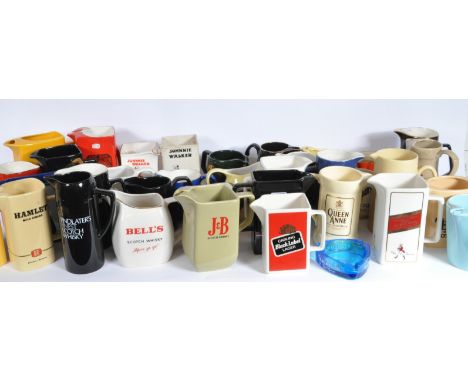 A large collection of approximately 32 vintage 20th century pub advertising Whisky jugs to include Teachers - This Is The Tru