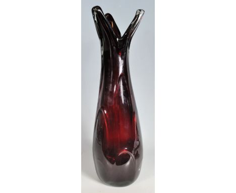 A large retro vintage late studio art glass Whitefriars style ruby vase having an open leaf style rim over a shaped base. No 