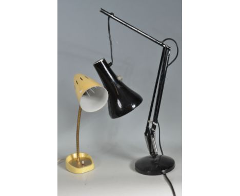 Two vintage retro 20th century angle poise desk lamps. A black enamel Herbert Terry o lamp with conical shade, articulated ar