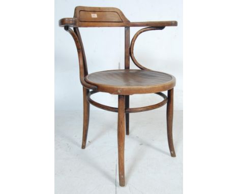 A 1920's Art Deco bentwood café chair with panel circle seats by Jacob and Josef Kohn complete with applied paper labels and 
