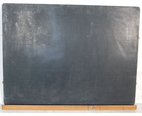 A large vintage late 20th century school chalkboard of rectangular form set within a wooden frame having a single chalk holde