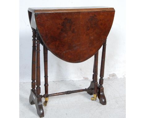 A very small proportioned Victorian 19th century burr walnut Sutherland table. The table, almost of apprentice size being ven