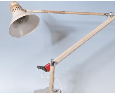 A retro vintage 1970s work bench lamp by Asea Belysning having a clamp base with a vented conical shaped cone over a hinged e
