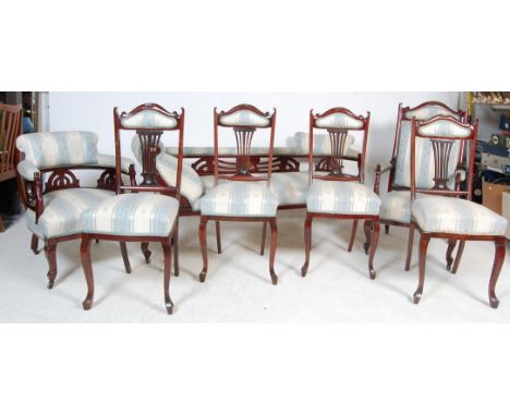 An early 20th century Edwardian mahogany&nbsp;seven piece salon suite. The suite comprising of double end&nbsp;chaise longue 