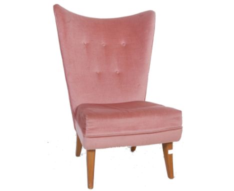 Believed Howard Keith - A retro vintage 20th Century wingback easy / lounge chair / armchair. The chair having a winged and b