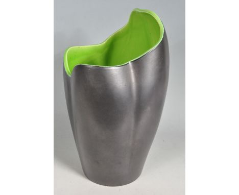 A large 20th century retro style black ceramic vase with green glazed interior. Makers stamp to the base. Measures 33cm tall.
