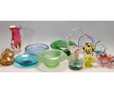 A large collection of retro and vintage studio art glass ware to include vases, ashtray, Murano flower basket, control bobble