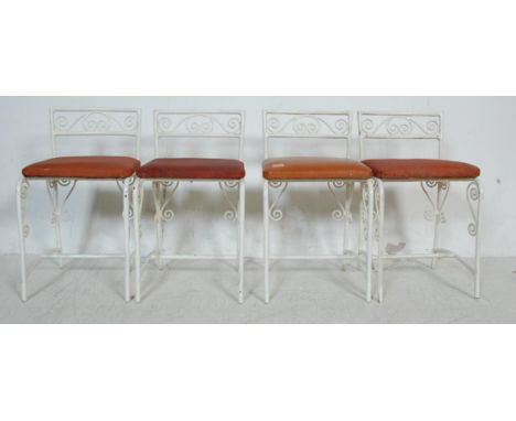 A set of four retro vintage mid century circa 1960’s French style black smith metal garden chairs / pub chairs. The chairs ha