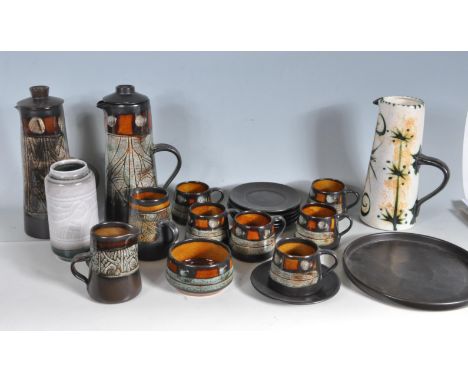 A group of vintage retro Cornish Newlyn Celtic pottery to include six coffee cups and saucers, two small jugs, two coffee pot