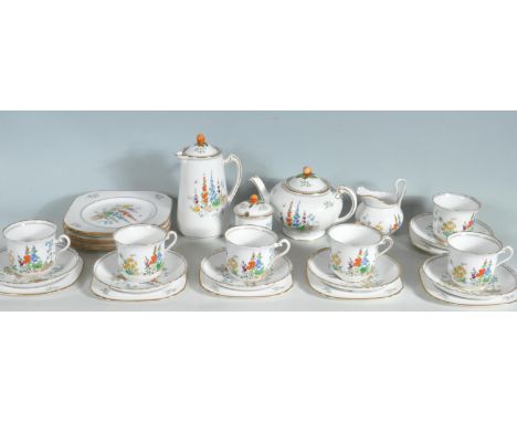 A vintage retro Tuscan china tea service all being decorated with fox glove florals with handles in the form of fruits, incud