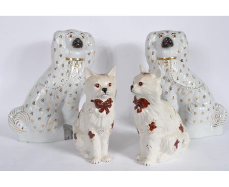 A pair of Victorian large Staffordshire fireside mantel piece Spaniels - dogs together with a smaller pair of Staffordshire c