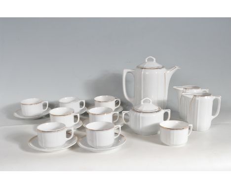 A vintage 20th century ceramic tea service by Kwatta &amp; Cida - Bois D'Haine -. The tea service comprises of a tea pot, cup