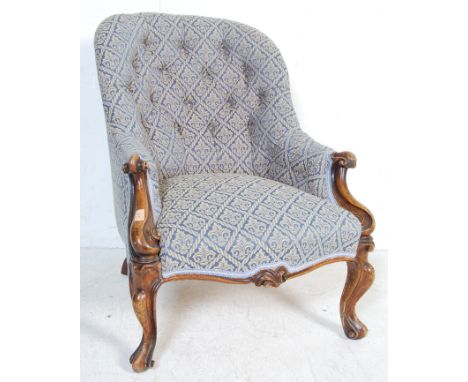 A good Victorian 19th century show wood mahogany armchair. Raised on scrolled legs with hoof feet having a good overstuffed u