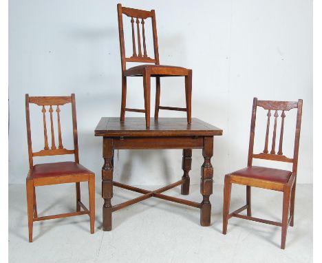 A vintage retro mid 20th century oak draw leaf dining table / pub table. The table having square top with two draw leaf sides