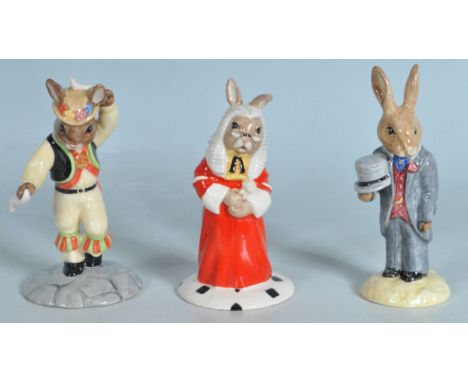 A group of three vintage 20th century Royal Doulton Bunnykins figurines to include Judge Bunnykins, Morris Dancer Bunnykins a
