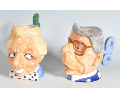 Two late 20th century vintage ceramic Kevin Francis - Peggy Davies limited edition toby mug figurines comprising of Spitting 