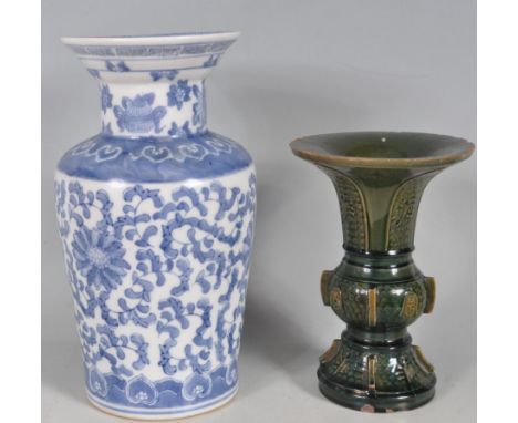 Two late 19th century early 20th century Chinese oriental vases. A large blue and with vase with floral motifs decoration and