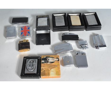 A collection of vintage retro 20th century and later Zippo lighters / cigarette lighters of various forms and designs togethe