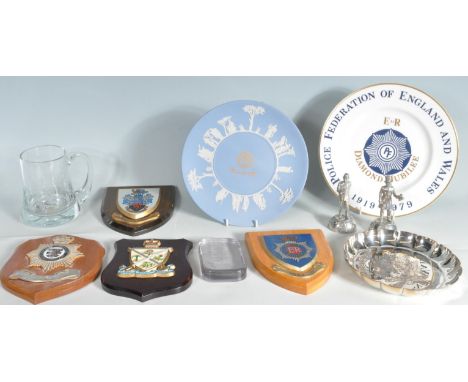 A collection of vintage 20th century and later United Kingdom Police related memorabilia comprising of a commemorative Wedgwo