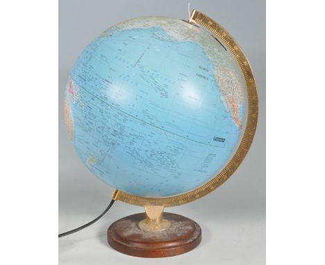 A mid 20th century Michelin desk top terrestrial globe / lamp. The spherical globe being well detailed with single arch scale