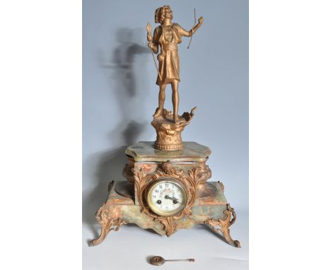 An early 20th century 1930s French Rococo style green alabaster and gilt mantel clock having a painted enamel clock face with