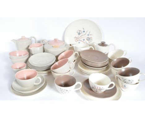 A collection of vintage retro Poole pottery ceramics to include a twin tone pink and grey part tea service, together with a f