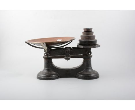 Set of cast iron balance scales, width 30cm; and a stoneware crock. (2)