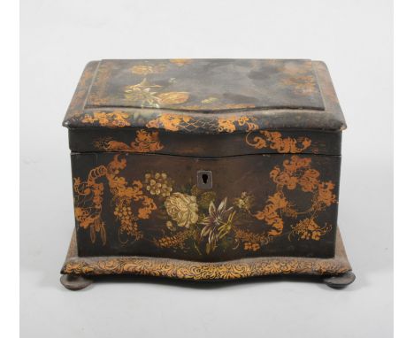 A Victorian papier mache bowfront tea caddy, painted decoration, two-section interior with covers, decorated with gilt work, 