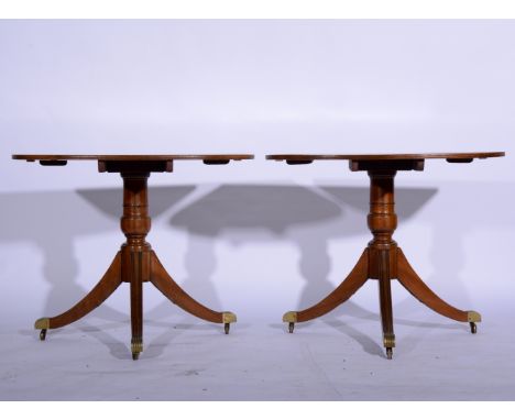 Pair of Regency style mahogany console tables/breakfast tables, baluster columns, tripod legs, width 92cm.