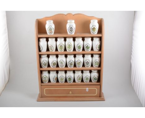 Collection of Franklin porcelain spice jars, on a beechwood spice rack, height 57cm.