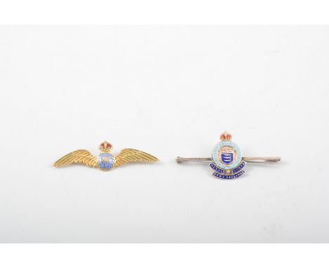 A yellow metal sweetheart brooch, 50m winged brooch marked 9ct having a blue enamel "RAF" centre with red enamel crown surmou