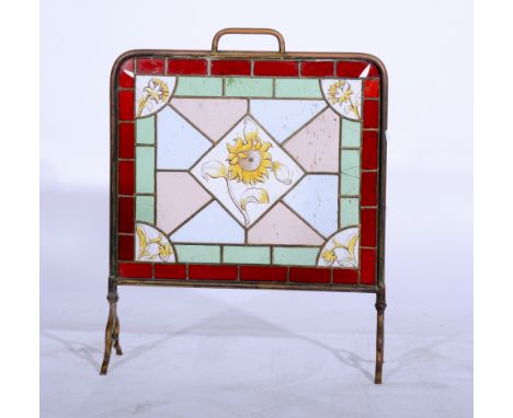 Victorian brass framed stained and leaded glass fire screen, width 57cm.