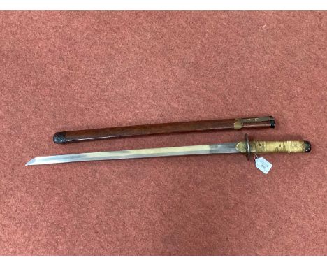 Japanese Wakizashi Sword and Scabbard, 60cm unsigned blade, decorated habaki and tsuba, wrapped fish skin grip, scabbard with
