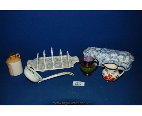A Swansea blue and white Toast rack, a similar toothbrush box, two lustre jugs , a small flagon and a ladle.