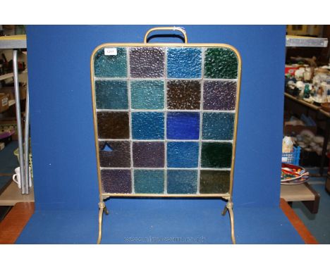 A glazed Firescreen with coloured glass panels, a/f.
