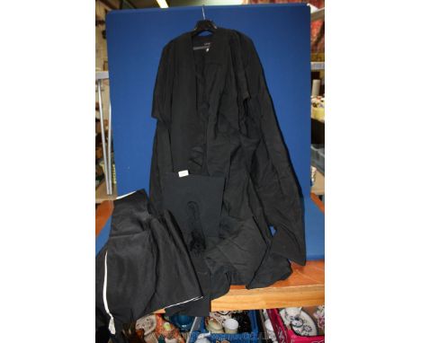 A Graduation Cap,Gown and Sash, gown and sash by Arthur Shepherd and cap by Ede& Son.