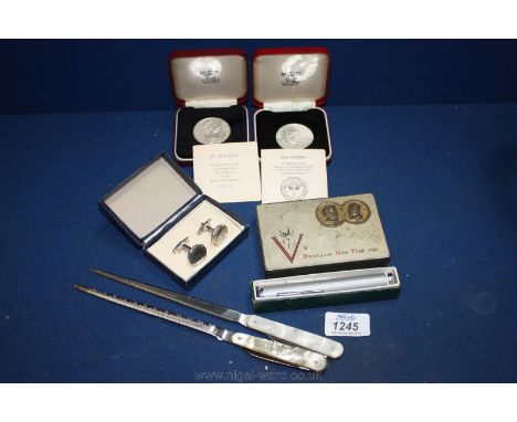 Two commemorative Crowns, boxed micro telescope, coin cuff links, two letter openers.