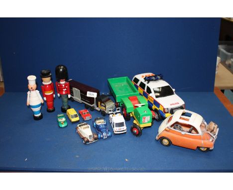 A quantity of Toys including wooden tractor and trailer, battery operated Police Car, small Tonka lorry and trailer, bubble s