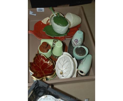 A quantity of Carltonware including two vintage Cruets, two lidded sauce boats and stands, one with ladle, two supper trays w