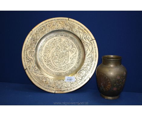 A heavy brass Oriental Wall Plaque with dragon detail and character mark to base, 12'' diameter together with a Brass Vase wi