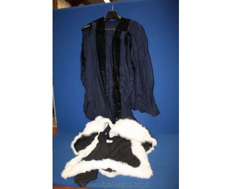 A hand made Graduation Gown in navy and black with a fur sash, also hand made.