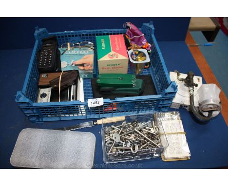 A quantity of miscellanea including boxed Singer skirt marker, Buttoneer, Remington Selectronic 800 shaver, pocket secatuers,
