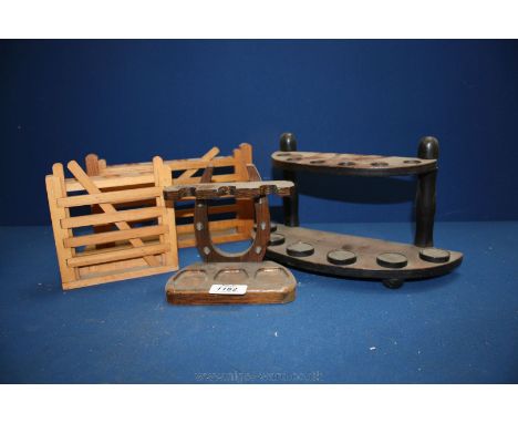 Four wooden Pipe Racks including two in the form of gates.