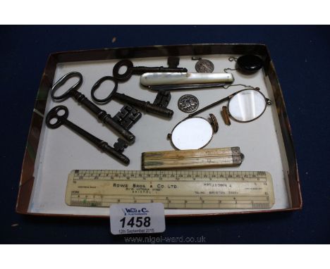 A Rowe Bros. & Co. Scale Rule, small four fold Ivory Ruler, pair of vintage spectacles with retracting chain holder, and two 