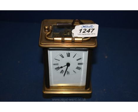 A French brass Carriage Clock  - with key.  4 1/2'' tall
