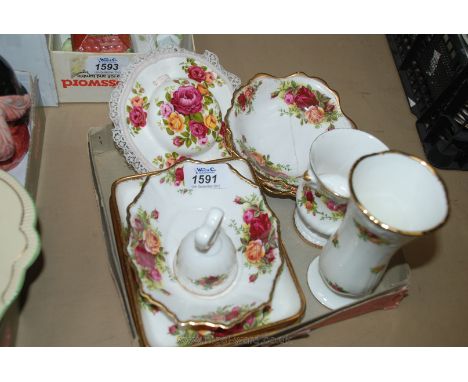 A quantity of Royal Albert 'Old Country Roses' trinket bowls, bell, bud vase, wall hat, etc. together with three small trays 
