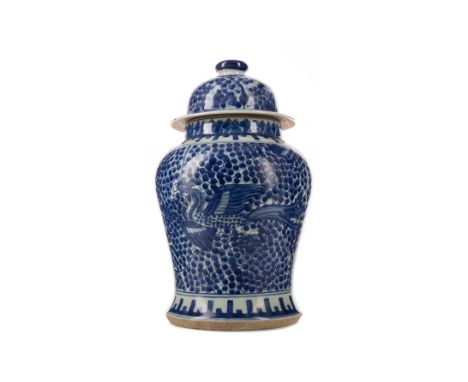 CHINESE BLUE AND WHITE PHOENIX JAR, late 19th century, of inverted baluster form, decorated with two phoenix against floral s