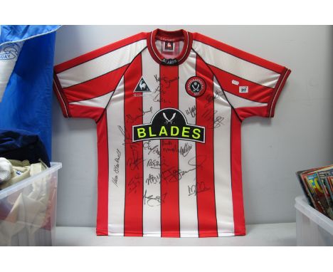 Sheffield United, Le Coq Sportif Home Shirt, circa 2001, bearing approximately eighteen ink signatures including Kevin Davies