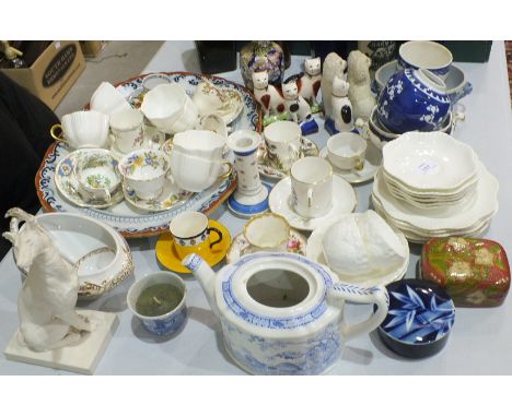 A collection of 19th and 20th century cabinet cups and saucers, an Ashworth stoneware meat dish and other ceramics.